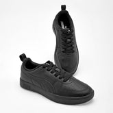 Tenis Rickie Jr para Joven marca Puma Negro