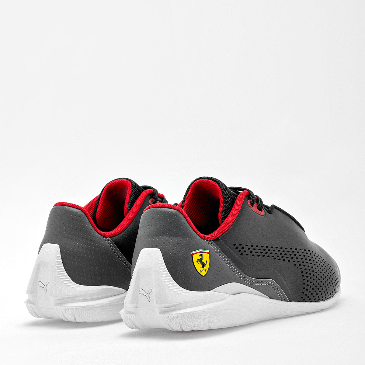 Tenis Ferrari Drift Cat Decima Jr para Joven marca Puma Negro cod. 119280