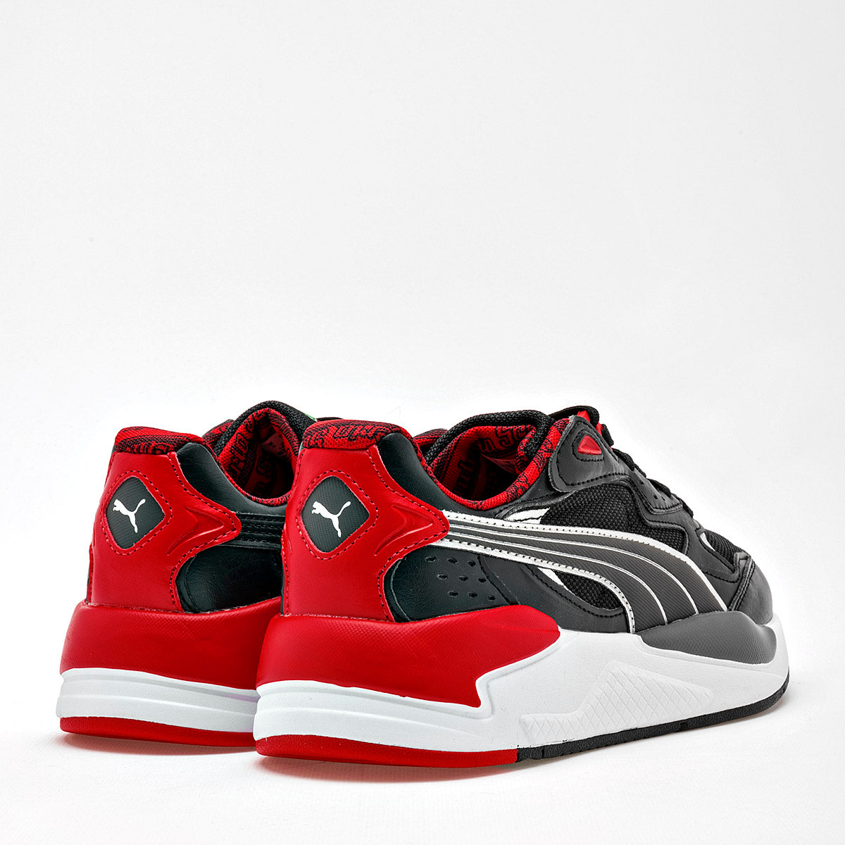 Tenis deportivo Ferrari X- Ray Speed Jr para joven marca Puma Negro cod. 119306