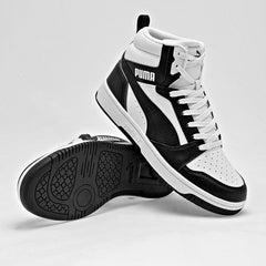 Tenis urbano tipo Botín Rebound v6 Mid Jr Puma para hombre
