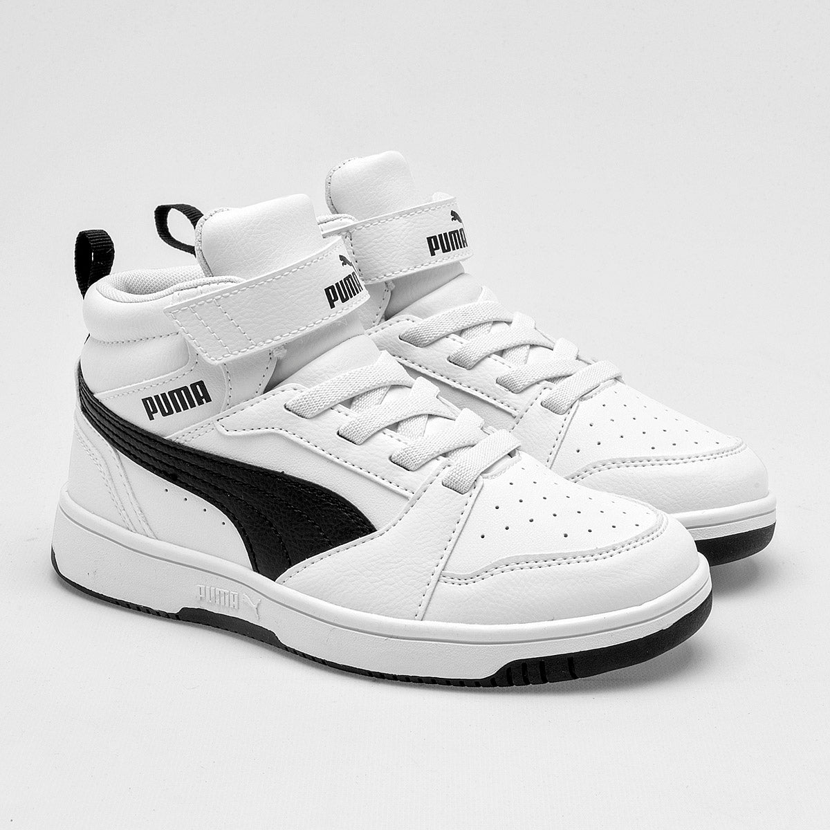 Pakar.com | Tienda online | Calzado Escolar | Tenis urbano tipo botín Rebound v6 Mid AC+ PS Puma para niño | Regreso a clases | Vacaciones de Verano