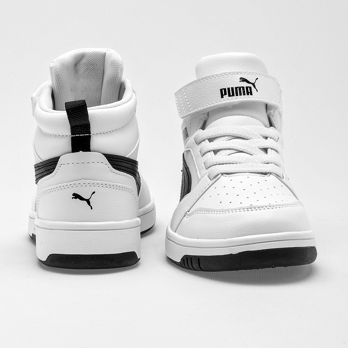 Pakar.com | Tienda online | Calzado Escolar | Tenis urbano tipo botín Rebound v6 Mid AC+ PS Puma para niño | Regreso a clases | Vacaciones de Verano