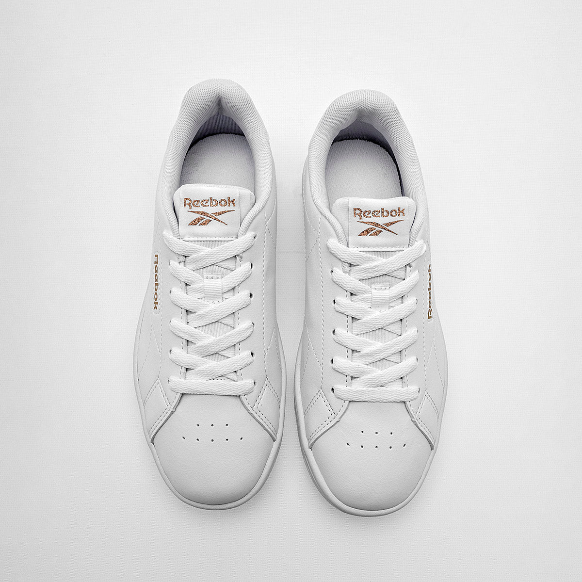 Pakar.com | Tienda online | Calzado Escolar | Tenis urbano Court Clean Reebok para mujer | Regreso a clases | Vacaciones de Verano