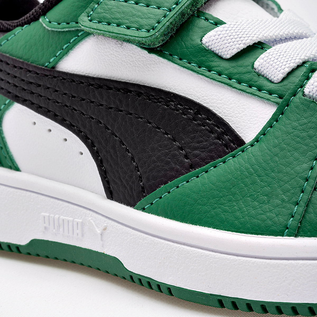 Tenis Rebound v6 Lo AC+ PS Puma para Niño