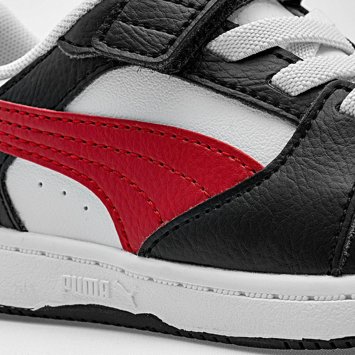 Tenis Rebound v6 Lo AC+ Inf Puma para Niño