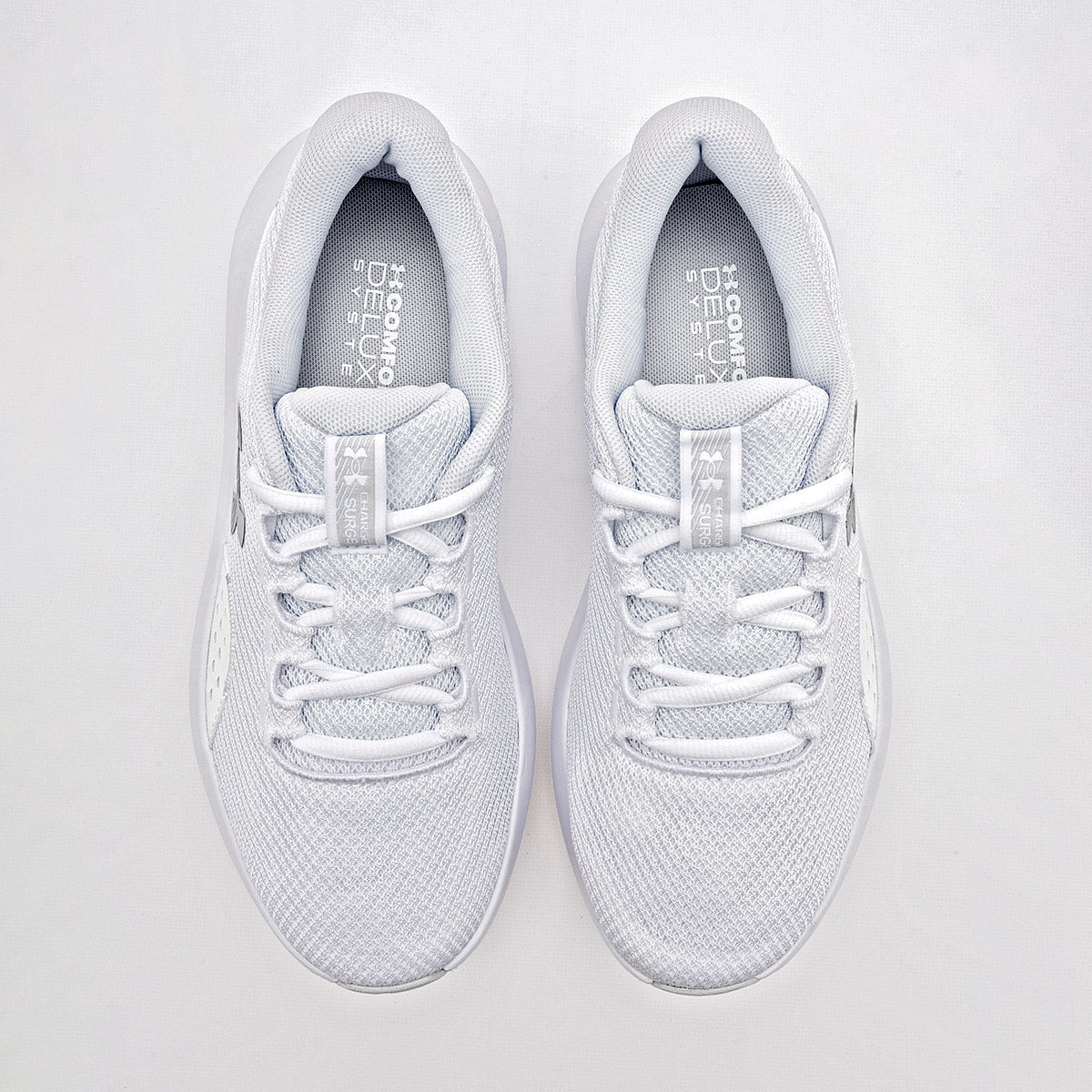 Tenis UA Charged Surge 4 Under Armour para Joven