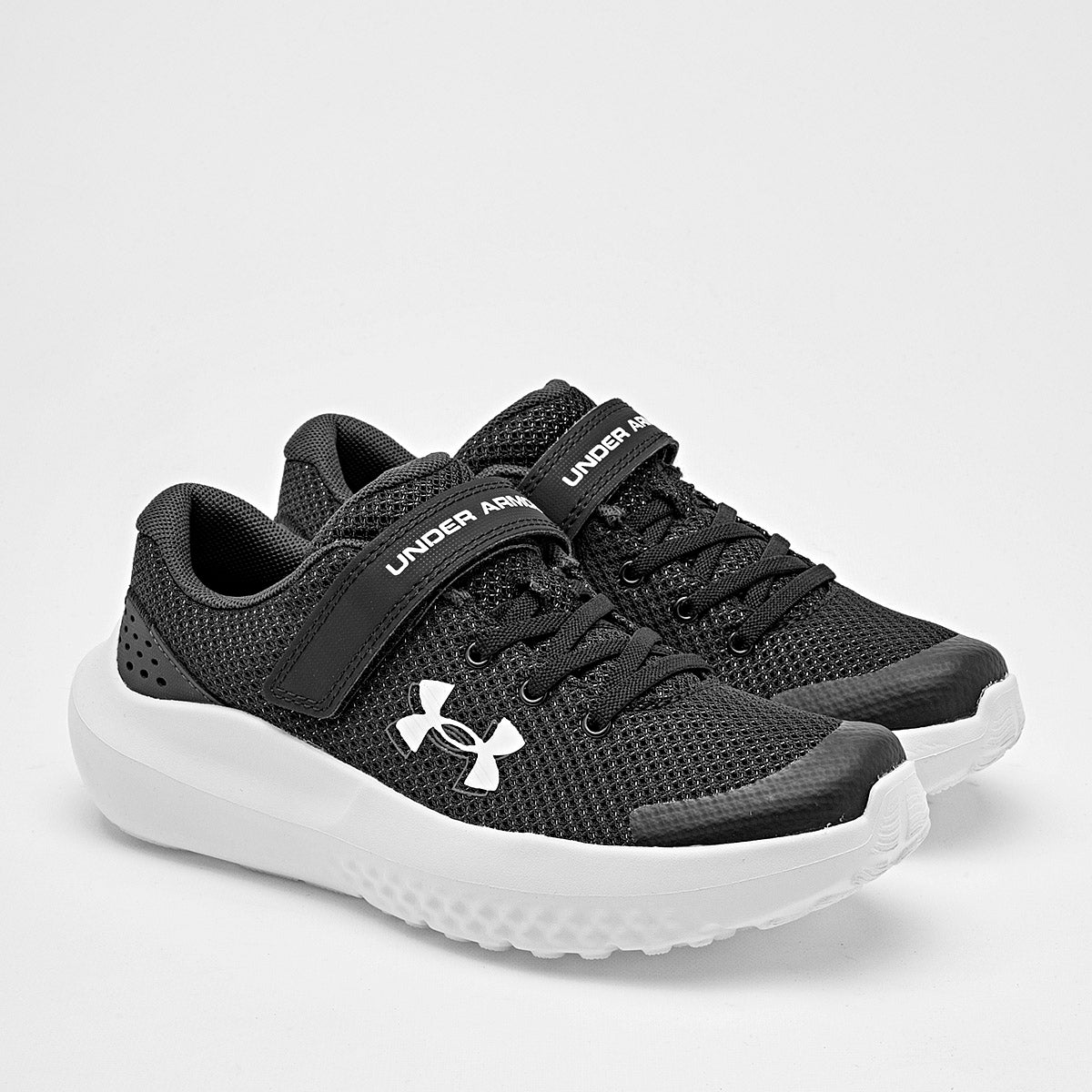 Tenis BPS Surge 4 AC Under Armour para Niño