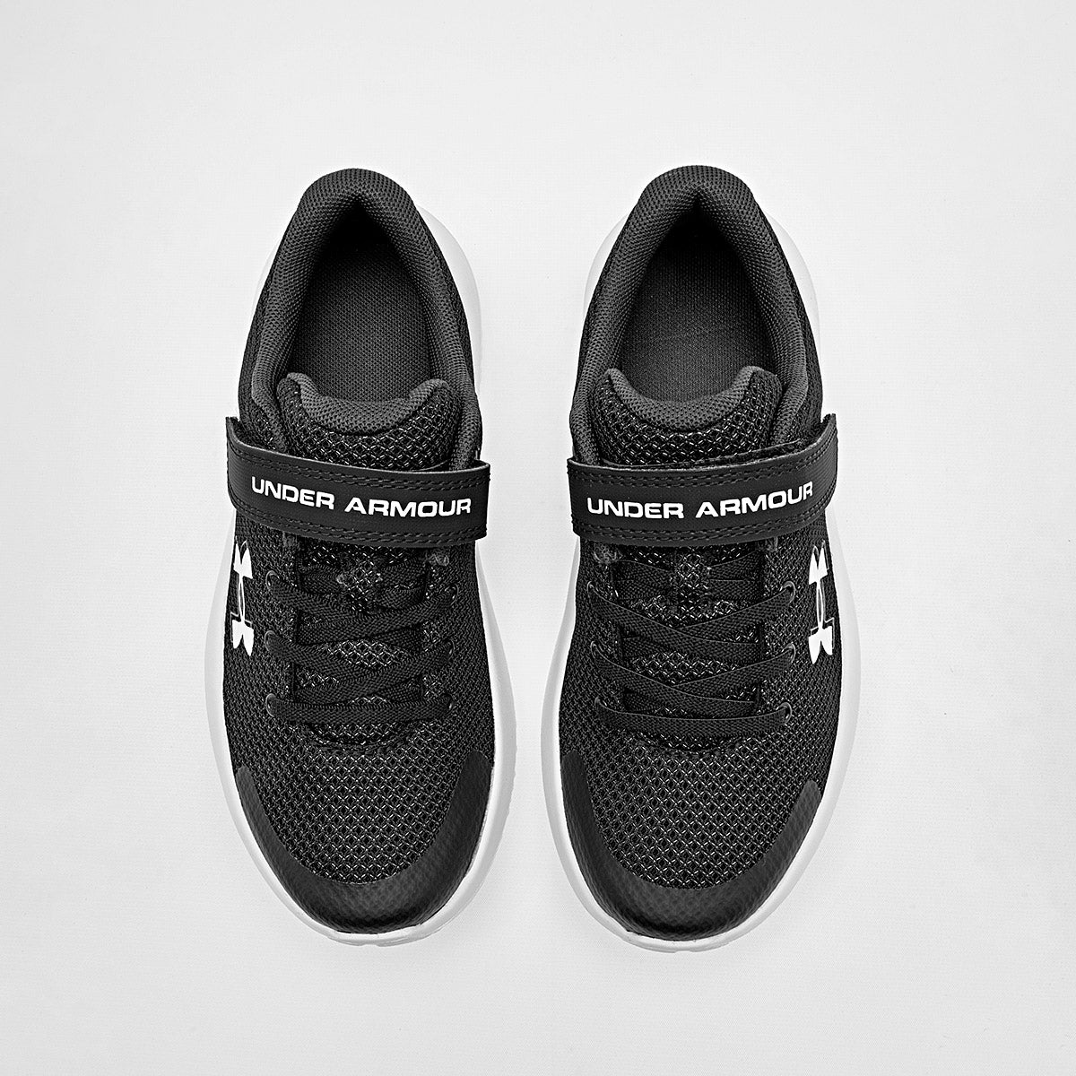 Tenis BPS Surge 4 AC Under Armour para Niño