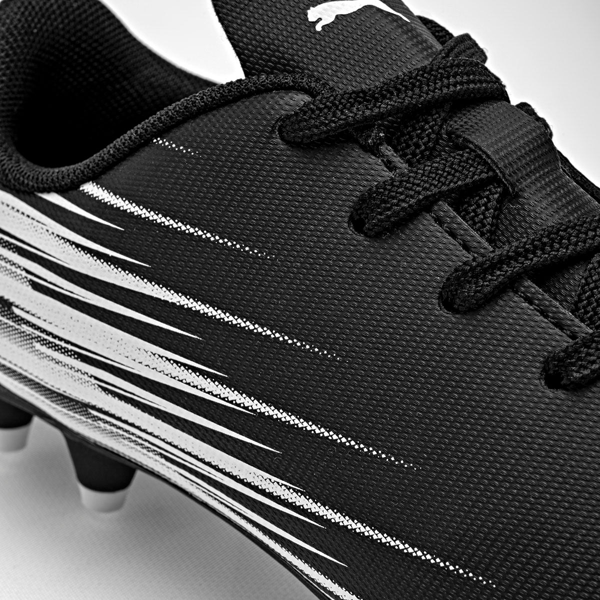 Tenis Attacanto II FG/AG Jr Puma para Joven